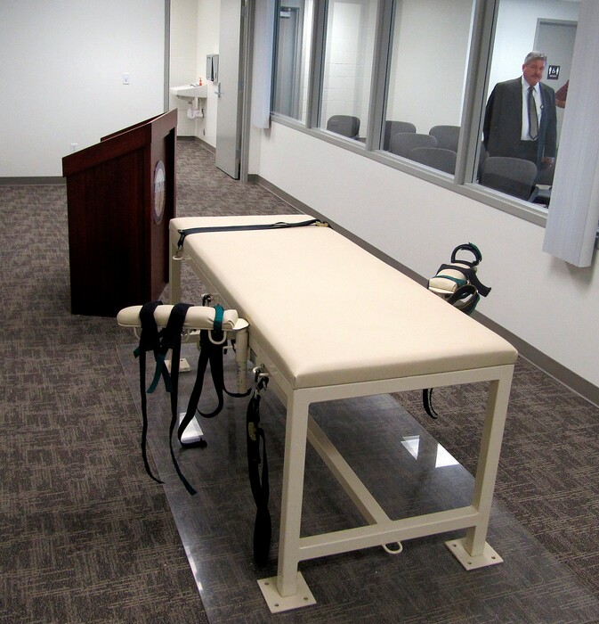 (Jessie L. Bonner | AP file photo) This Oct. 20, 2011, file photo shows the execution chamber at the Idaho Maximum Security Institution as Security Institution Warden Randy Blades look on in Boise, Idaho. The Idaho Supreme Court recently ruled that records about lethal injection drugs used in executions are public. Among the information revealed was that a Salt Lake City pharmacy was the source for lethal drugs used in the Nov. 18, 2011, execution of Paul Ezra Rhoades.