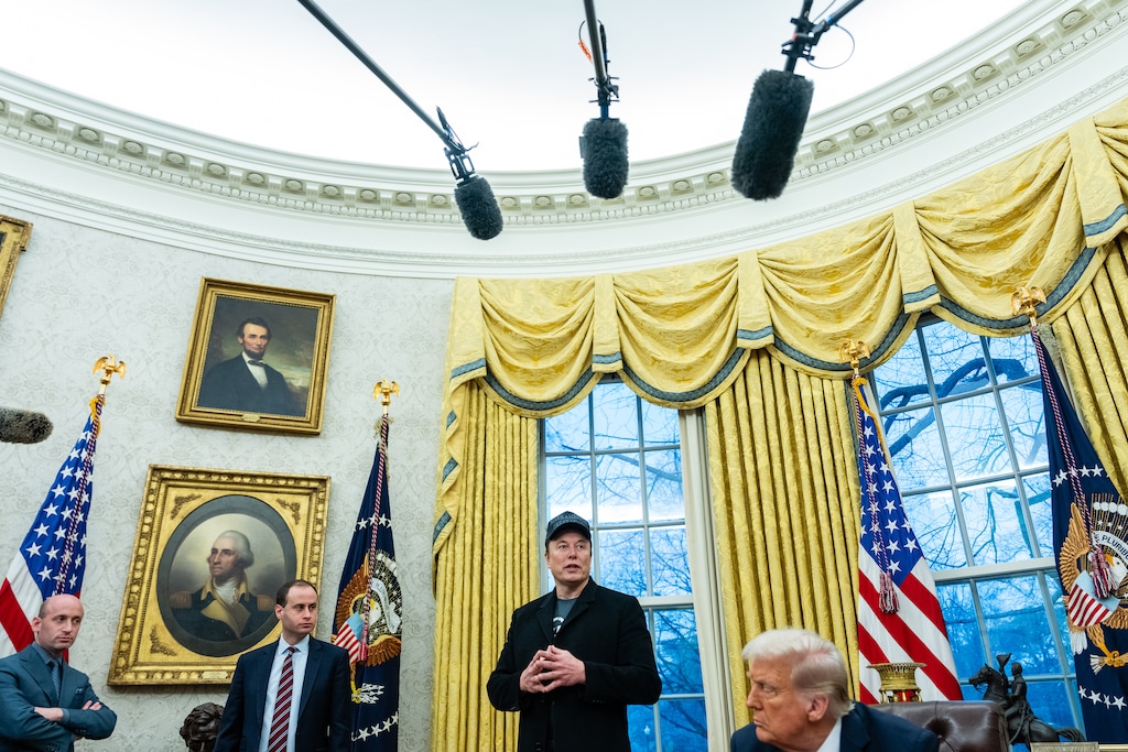 (Eric Lee | The New York Times) President Donald Trump and Elon Musk explain the administration’s cost-cutting efforts in the Oval Office of the White House in Washington, on Tuesday, Feb. 11, 2025.