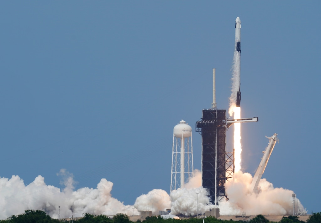 A SpaceX Falcon 9 lifts off from Pad 39-A at the Kennedy Space Center in Cape Canaveral, Fla., Saturday, May 30, 2020. (AP Photo/David J. Philip)