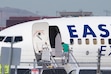 (Chris Samuels | The Salt Lake Tribune) Detainees believed to be in the custody of Immigration and Customs Enforcement board a plane at Salt Lake City International Airport, Monday, April 6, 2026.