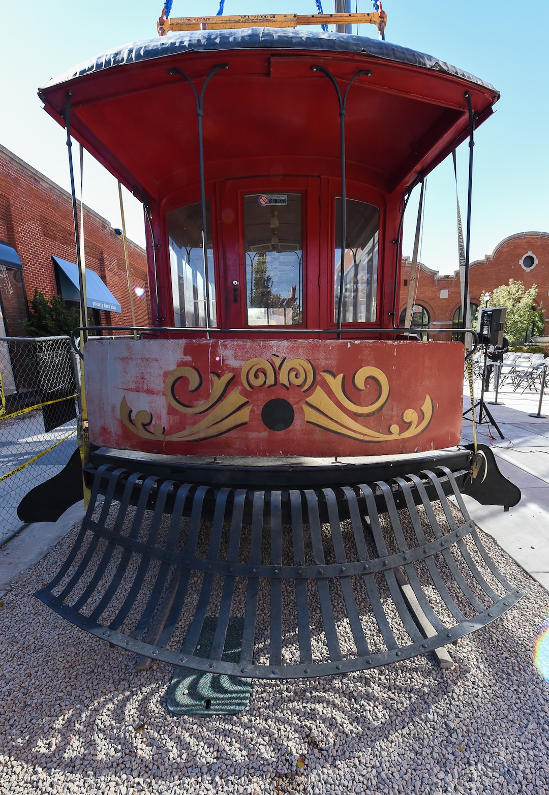 (Francisco Kjolseth  |  Francisco Kjolseth)  The iconic trolley car, that has been sitting in storage for several years, is moved back into view at Trolley Square on Monday, Oct. 15, 2018. The empty trolley car, last seen housing the Trolley Wing Company was moved into place on the north plaza by Pottery Barn.