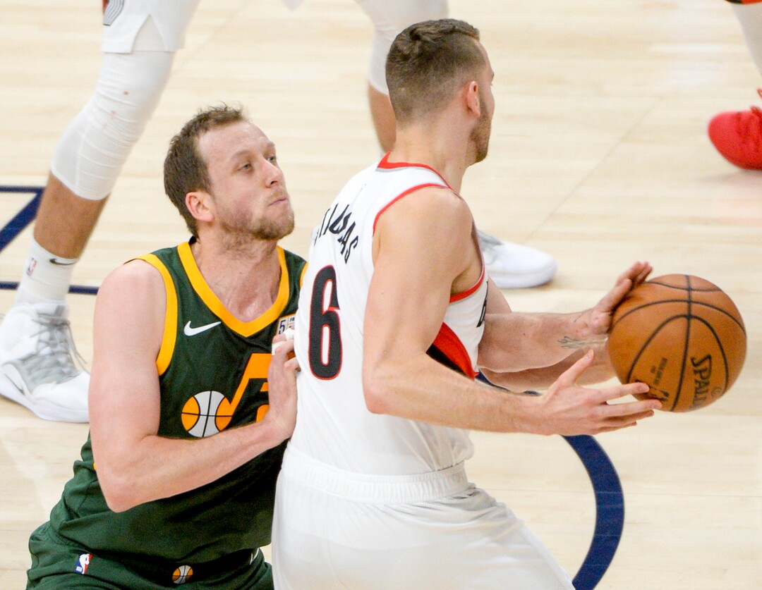 Leah Hogsten  |  The Salt Lake Tribune  Utah Jazz forward Joe Ingles (2) tries to steal from Portland Trail Blazers guard Nik Stauskas (6)as the Utah Jazz host the Portland Trail Blazers Christmas night at Vivint Smart Home Arena.