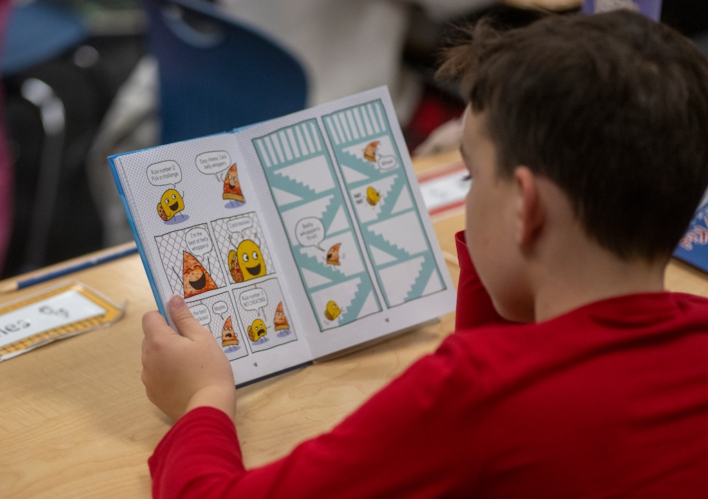 (Rick Egan | The Salt Lake Tribune) A student reads at Fox Hollow Elementary School, part of the current Alpine School District, on Tuesday, Jan 7, 2025. The Alpine district will split in July 2027, creating three new districts, including Lake Mountain.