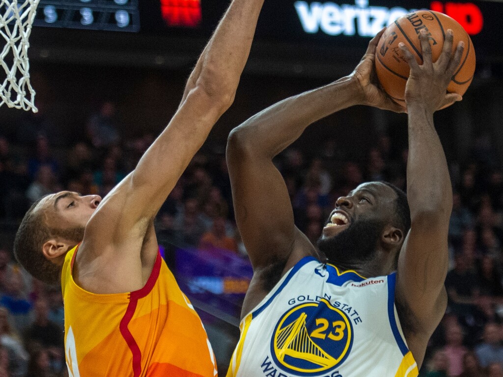 (Rick Egan  |  The Salt Lake Tribune)  Utah Utah Jazz center Rudy Gobert (27) prepares to block a shot by Golden State Warriors forward Draymond Green (23), in NBA action between Utah Jazz and Golden State Warriors, in Salt Lake City, Wednesday, Dec. 19, 2018.