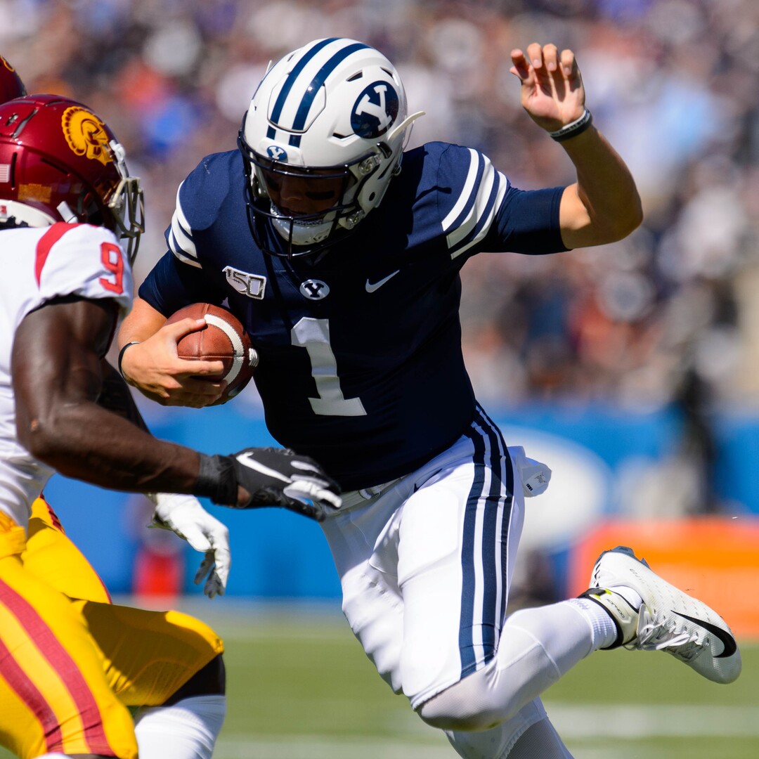 (Trent Nelson  |  The Salt Lake Tribune)  Brigham Young Cougars quarterback Zach Wilson (1) runs the ball as BYU hosts USC, NCAA football in Provo on Saturday Sept. 14, 2019.