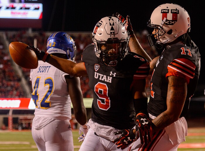 (Trent Nelson | The Salt Lake Tribune) Utah Utes wide receiver Darren Carrington II (9) celebrates a touchdown with teammate Utah Utes wide receiver Raelon Singleton (11) as the Utah Utes host the San Jose State Spartans, NCAA football at Rice-Eccles Stadium in Salt Lake City, Saturday September 16, 2017.