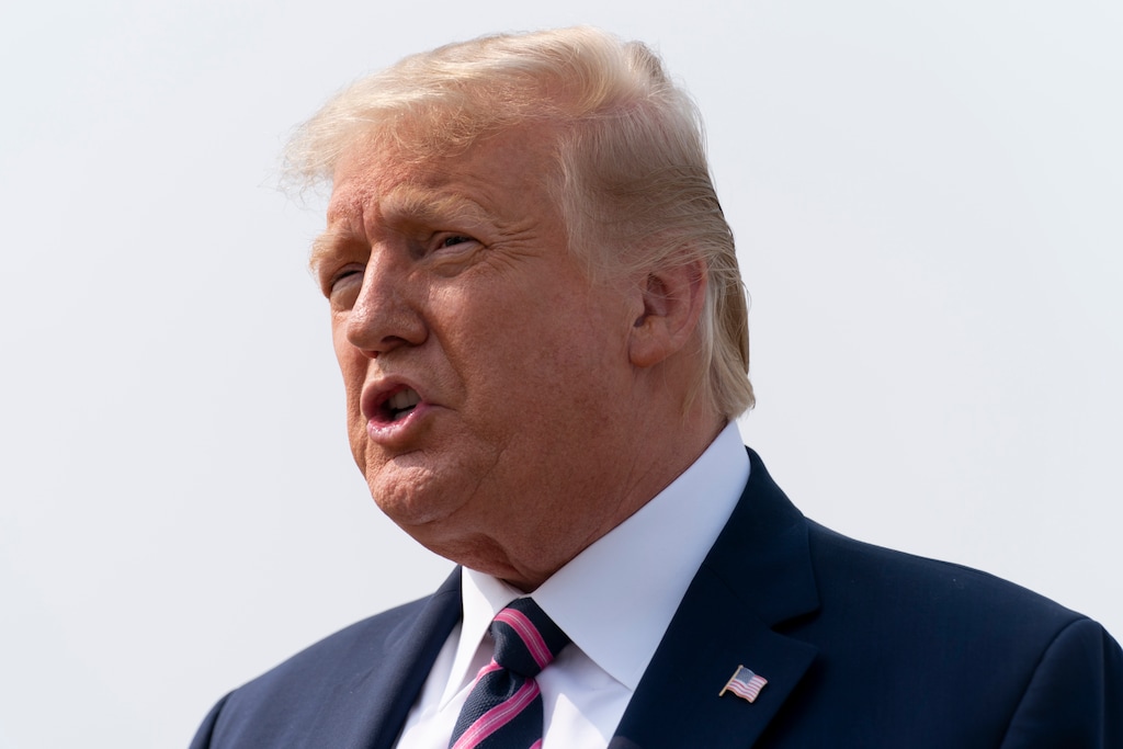 (Andrew Harnik | AP)  President Donald Trump speaks to reporters as he arrives at Sacramento McClellan Airport, in McClellan Park, Calif., Monday, Sept. 14, 2020, for a briefing on wildfires.