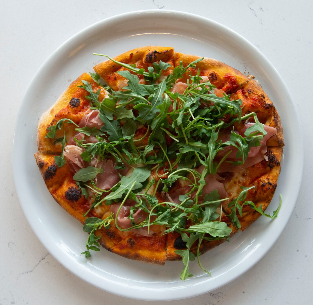 (Rick Egan  |  The Salt Lake Tribune)       Prosciutto and Arugula Pizza at Stratford Proper Cafe & Bistro. Tuesday, April 16, 2019.