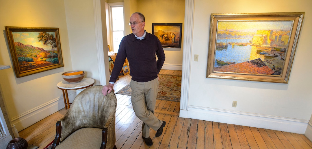 (Steve Griffin  |  The Salt Lake Tribune) Dave Erickson with three of 11 historic Utah paintings that he will be selling in a private sealed bid auction for the Logan City School District. The paintings are on display at Dave Erickson Fine Art in Salt Lake City Monday January 8, 2018.