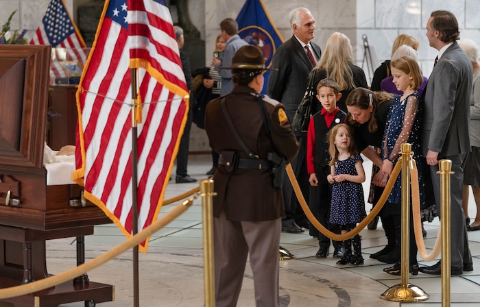 (Francisco Kjolseth | The Salt Lake Tribune) Friends and family pay their respects to former U.S. Sen. Orrin Hatch during a public viewing at the Utah Capitol on Wednesday, May 4, 2022. 