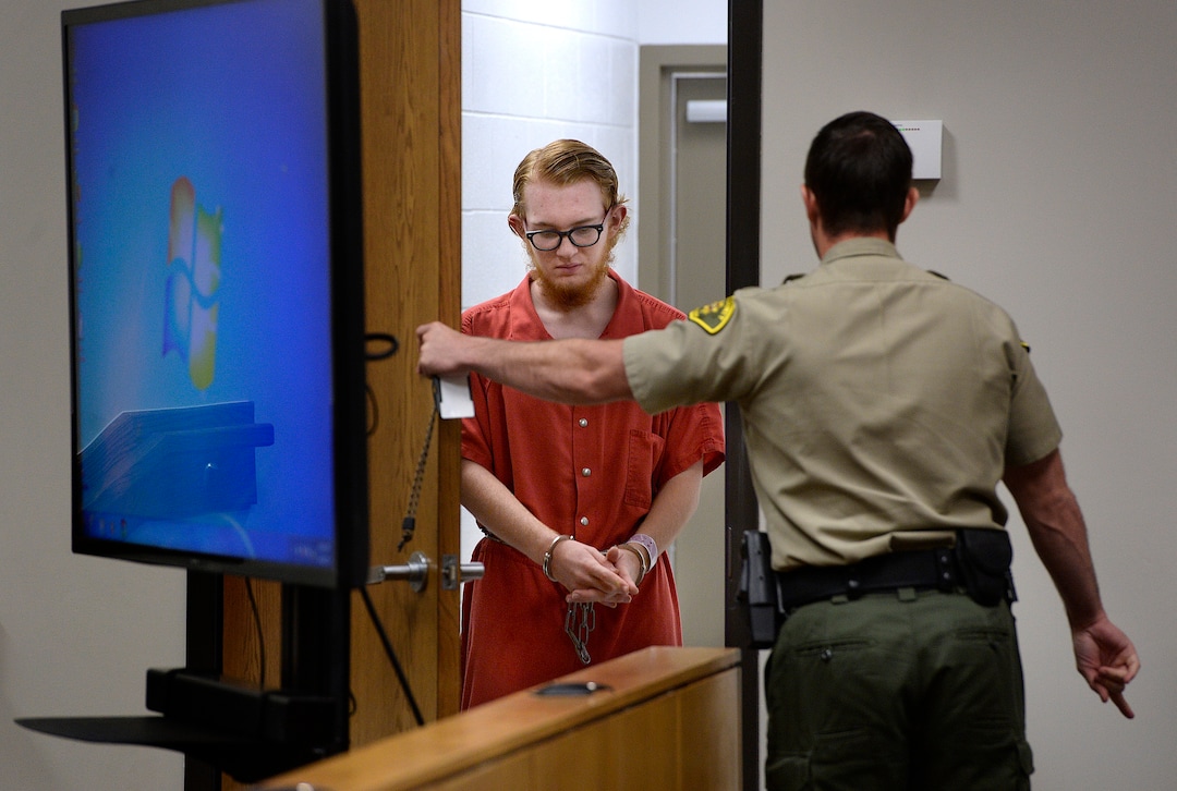 (Scott Sommerdorf   |  The Salt Lake Tribune)   Defendant Tyerell Joe Przybycien, 18, of Spanish Fork, returns to court following a break that was taken after the video showing the hanging death was shown during his preliminary hearing, Wednesday, August 23, 2017.  Przybycien is charged with first-degree felony murder for buying items used by a 16-year-old girl to hang herself on May 5 in Utah County.  Przybycien also recorded the girl's death, according to charges.