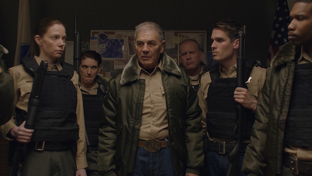 (Photo courtesy of Orion Classics) Sheriff Hadley (Robert Forster, center) leads his deputies, including Julia Robson (Riki Lindhome, left) and John Marshall (Jim Cummings, right) as they pursue a killer,  in the filmed-in-Utah horror thriller "The Wolf of Snow Hollow."