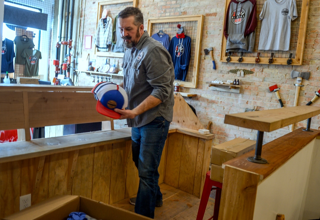 (Leah Hogsten  |  The Salt Lake Tribune)   Social Axe Throwing co-owner Mark Floyd boxes the business's merchandise to take to the Salt Lake location.