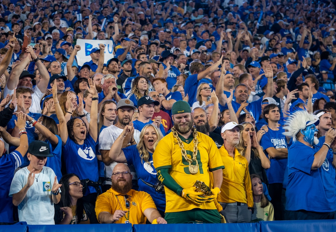 (Rick Egan | The Salt Lake Tribune)  Brigham Young Cougar fans cheer and Baylor fans react as BYU takes the lead  scoring their first touchdown of the night, in football action between the Brigham Young Cougars and the Baylor Bears at Lavell Edwards Stadium in Provo, on Saturday, Sept. 10, 2022.