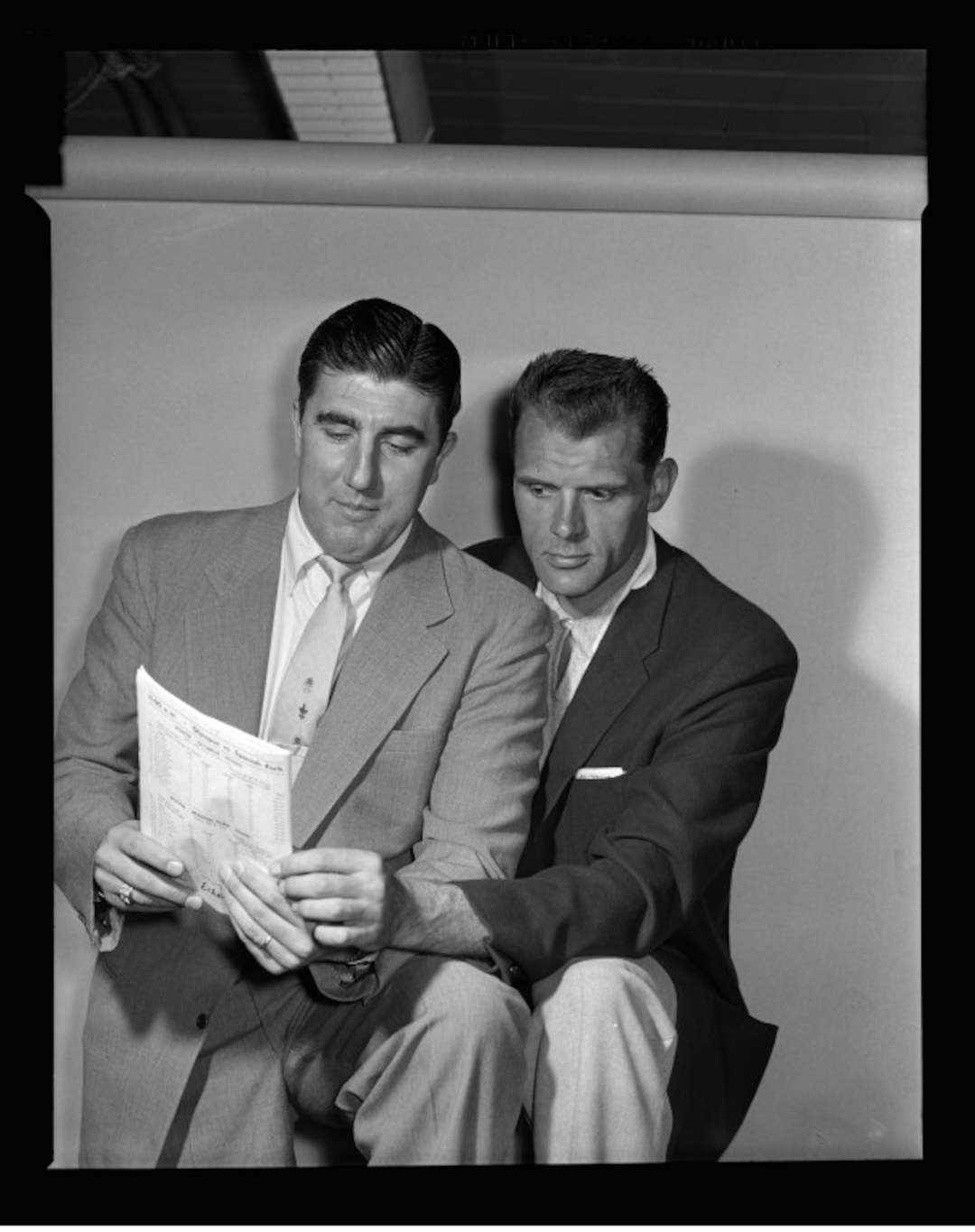 (Tribune file photo) Vince Borlya, left, and Mel Hutchins, stand together for this April 12, 1957, photo. Borlya was then a coach for the New York Knicks. Hutchins, a former BYU basketball player, played the 1956-1957 season with the Fort Wayne Pistons then joined the Knicks. Borlya died in 2016. Hutchins died Dec. 19, 2018.