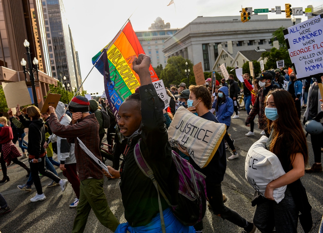 (Leah Hogsten  |  The Salt Lake Tribune) Demonstrators with Black Lives Matter marched from the Utah Capitol down State Street, stopping at every intersection for five minutes in honor of George Floyd, June 8, 2020.
