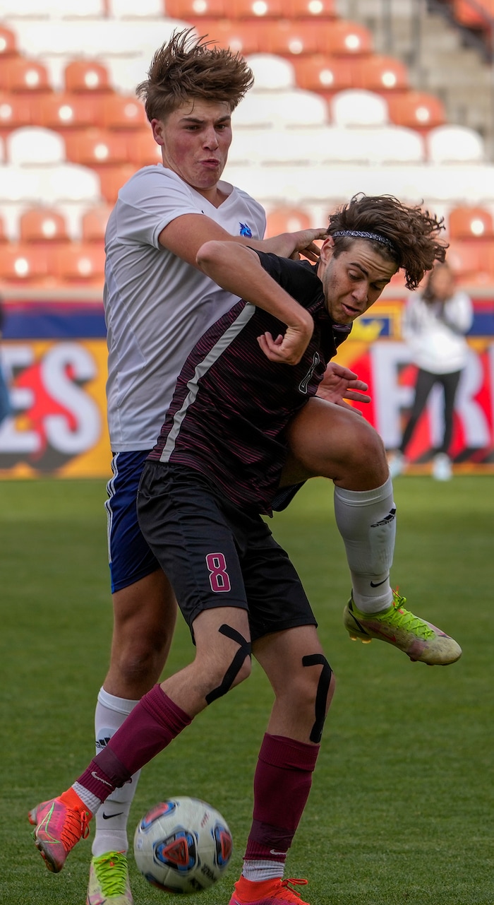 (Leah Hogsten | The Salt Lake Tribune) Real's Noe Vandamme takes a header with Layton's Danilo Obradovic as Real Salt Lake Academy meets Layton Christian Academy for the 3A State Soccer Championship title at Rio Tinto Stadium, Wednesday, May 11, 2022. Layton Christian Academy won the title 4-0. 