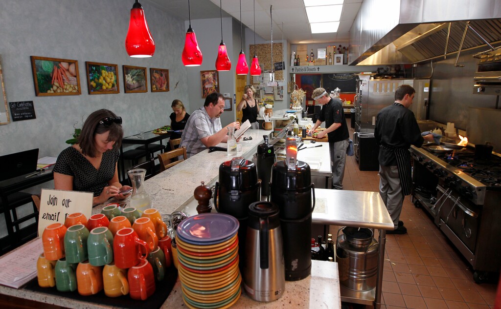 (Al Hartmann | Tribune file photo) Avenues Bistro on Third features an original soda fountain counter.