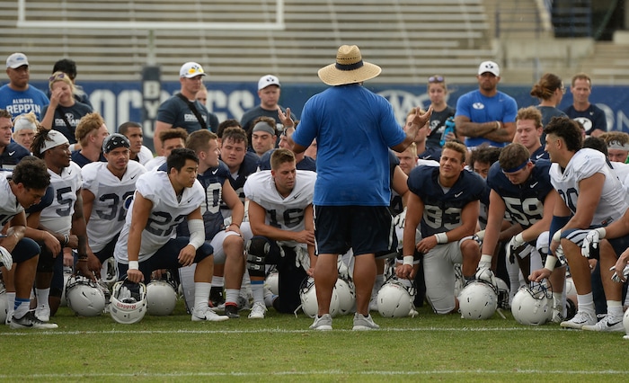 (Francisco Kjolseth  |  The Salt Lake Tribune)  BYU head coach Kalani Sitake speaks with his team following a scrimmage at LaVell Edwards Stadium in Provo on Thursday, Aug. 10, 2017.