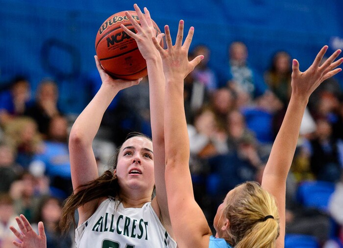 (Trent Nelson | The Salt Lake Tribune)  Hillcrest's Annabella Jensen (31) shoots over Westlake's Jillian Vance (20) as Hillcrest faces Westlake in the 6A High School Girls' Basketball Tournament at SLCC in Taylorsville, Thursday Feb. 22, 2018.