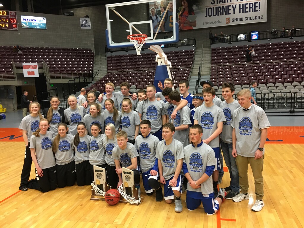 Tom Wharton  |  For The Tribune
The Panguitch boys' and girls' basketball teams pose for a photo after both won the Class 1A state championships Saturday in Richfield.