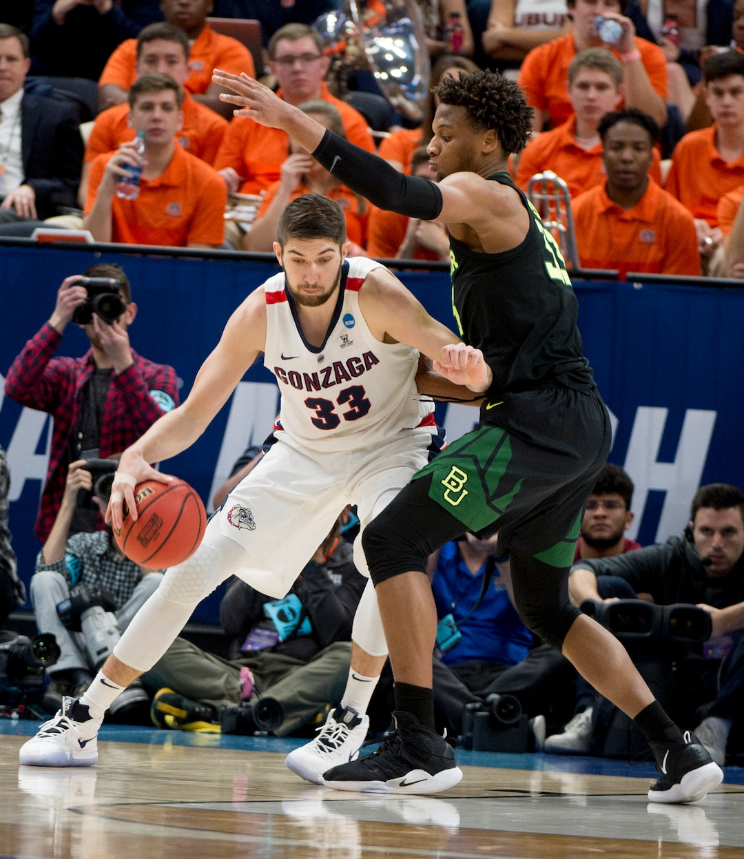 (Leah Hogsten  | The Salt Lake Tribune)  Gonzaga Bulldogs forward Killian Tillie (33) is defended by Baylor Bears forward Freddie Gillespie (33) as Baylor faces Gonzaga in the second round of the NCAA tournament in Salt Lake City on Saturday, March 23, 2019.