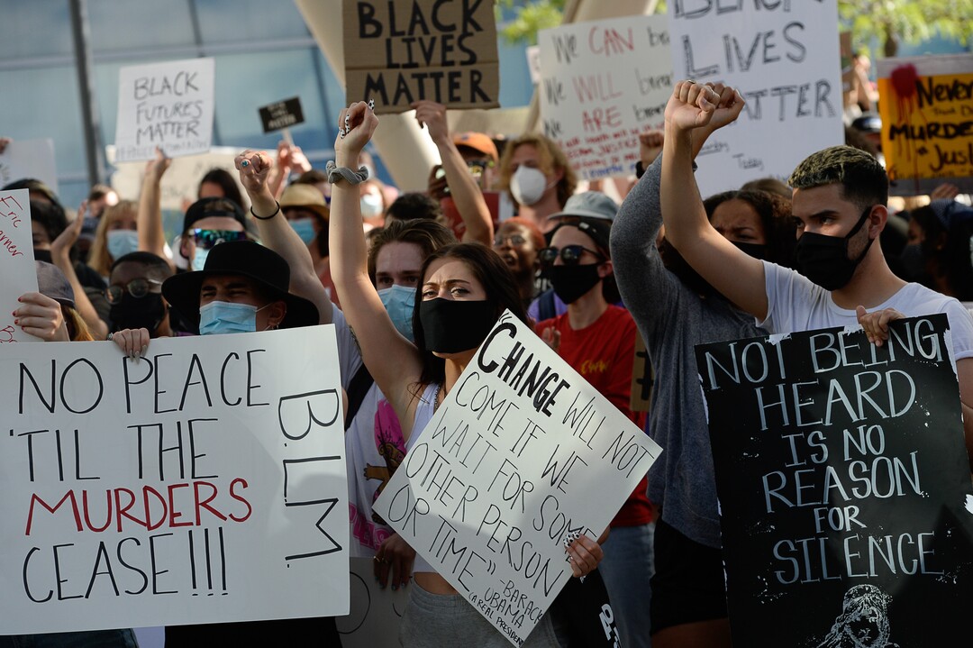 (Francisco Kjolseth  |  The Salt Lake Tribune) Demonstrators protest against police brutality at the Salt Lake City Public Safety Building on Wednesday, June 3, 2020, as the initially set 8 p.m. weeklong curfew was removed.