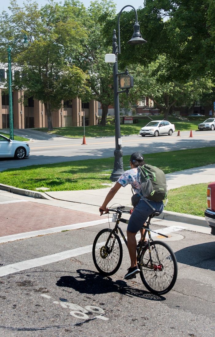 (Rick Egan  |  The Salt Lake Tribune)      Salt Lake City has installed ten traffic signal detectors, which use a radar device that is triggered by people riding bicycles, to help bicyclists cross the street when no traffic is around. Wednesday, Aug. 1, 2018.


