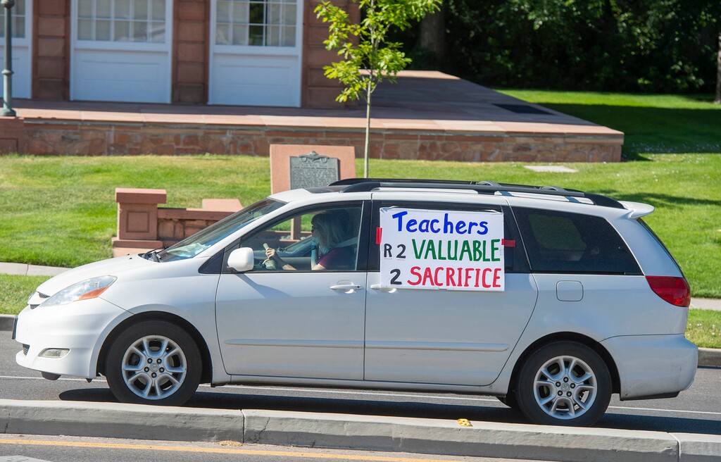 (Rick Egan | Tribune file photo) A caravan of cars honks as they drive past the State Capitol, during a Mask-In and Car Caravan protest at the State Capitol to demand the governor and other state and local leaders ensure that Utah schools protect students and staff when schools reopen, on Thursday, July 23, 2020.
