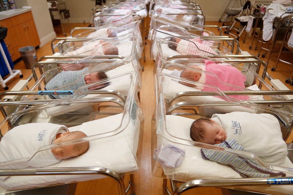 (Seth Wenig | The Associated Press) In this Feb. 16, 2017, file photo newborns rest in a hospital nursery.