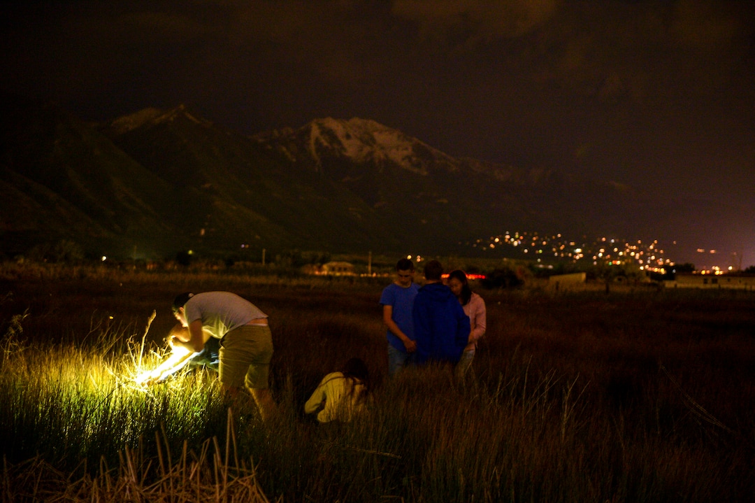 (Leah Hogsten  |  The Salt Lake Tribune) Visitors marvel at the sight of fireflies, many for the first time. Fireflies have been twinkling in the hay fields of Garcia's family farm, Thompson Century Farm near Spanish Fork, since her great-great-grandfather Samuel Thompson settled the farm in 1800s. The farm and its wet, marshy habitat is perfect for the fireflies' annual mating rituals every year, roughly from late May to early July. Garcia leads tours through her fields for free, simply to share in the experience and to educate others about fireflies, their short-lived lifecycle and what endangers their fragile habitat.