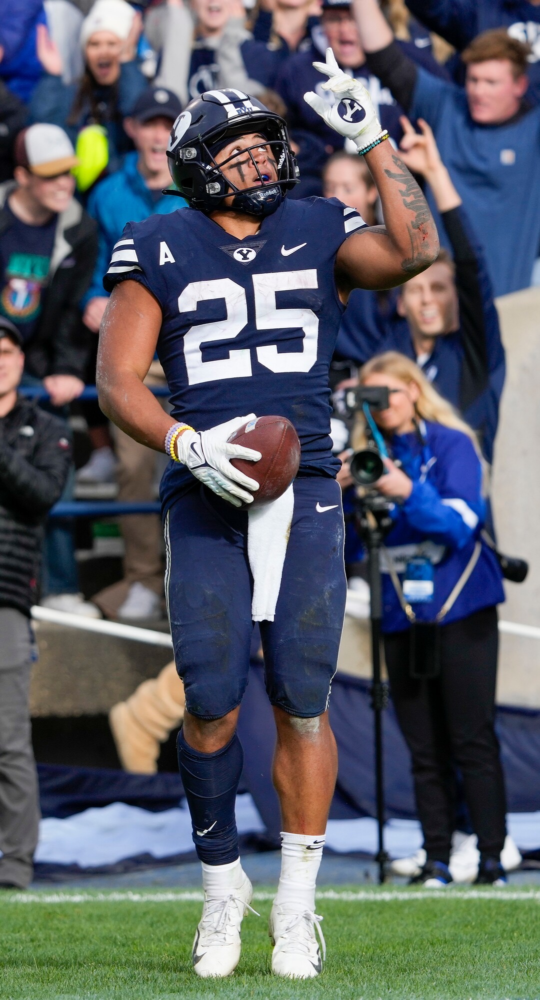 (Leah Hogsten | The Salt Lake Tribune) Brigham Young Cougars running back Tyler Allgeier (25) celebrates his  touchdown as No. 10 Brigham Young University hosts Boise State at LaVell Edwards Stadium, Oct. 9, 2021.