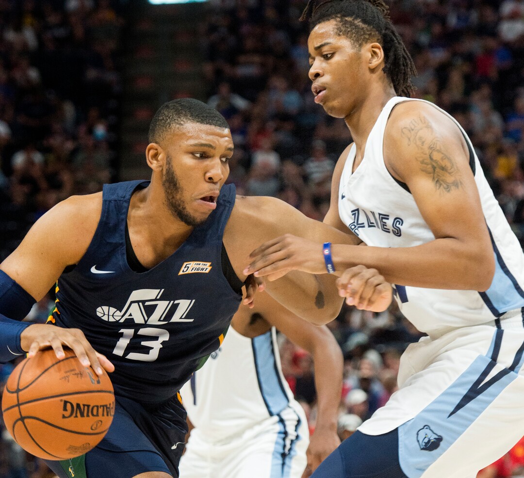 (Rick Egan  |  The Salt Lake Tribune)      Utah Jazz center Tony Bradley (13) works the ball inside, as Memphis Grizzlies center Deyonta Davis (21) defends, in Utah Jazz summer league action between Utah Jazz and Memphis Grizzlies in Salt Lake City, Tuesday, July 3, 2018.