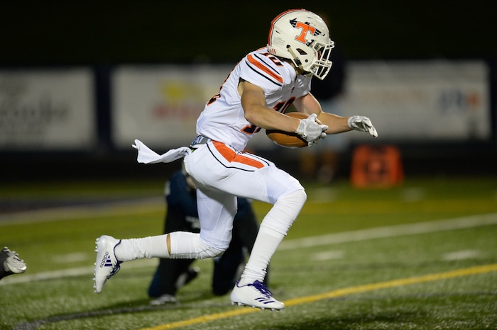 (Francisco Kjolseth  |  The Salt Lake Tribune)  Timpview's Payton Madson runs the ball in game action between Timpview at Corner Canyon on Thursday, Sept. 21, 2017.