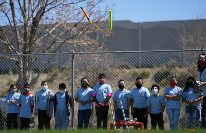 (Francisco Kjolseth | The Salt Lake Tribune) Mary W. Jackson Elementary students commemorate their school’s namesake’s 100th birthday on Friday, April 9, 2021, with a special science lesson, including the mechanics of rocket building as they launched their creations into the air. Salt Lake City’s oldest elementary school was renamed in 2018 in honor of the the first African American female engineer at NASA, with students recently voting to change their mascot to “The Rockets.”
