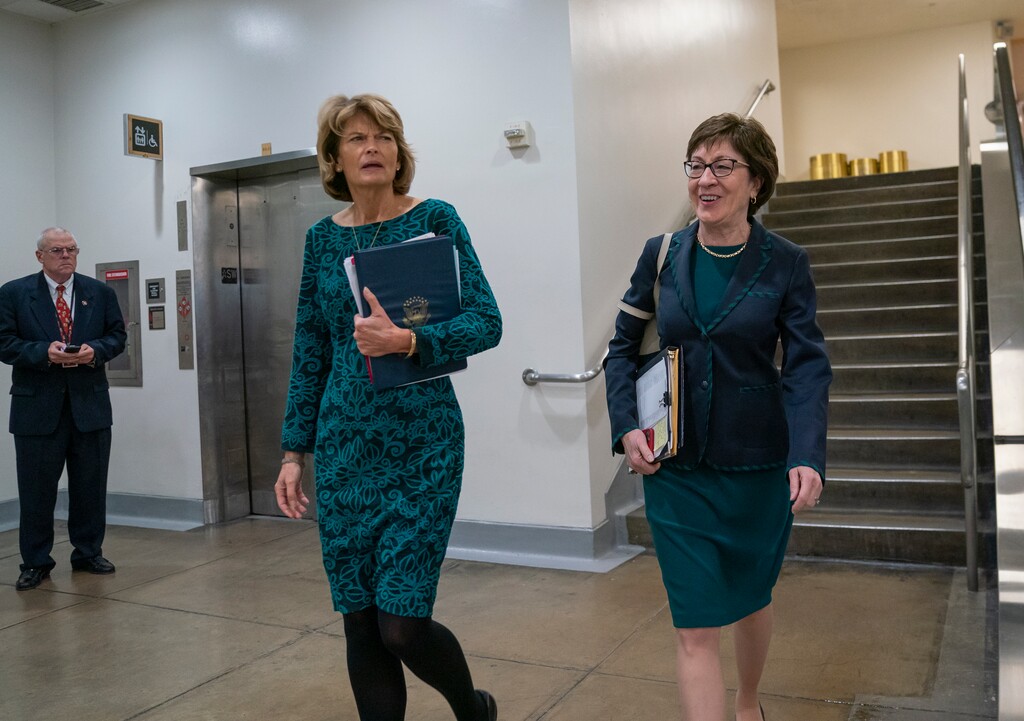 (J. Scott Applewhite | AP) Sen. Lisa Murkowski, R-Alaska, left, and Sen. Susan Collins, R-Maine, walk together following a vote at the Capitol in Washington, Wednesday, Feb. 12, 2020.