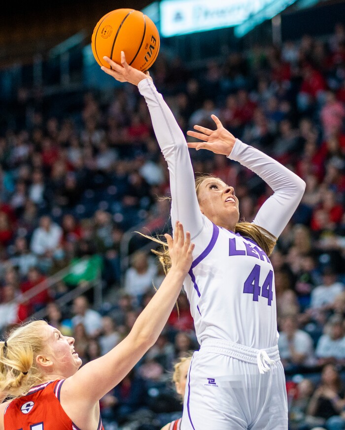 (Rick Egan | The Salt Lake Tribune) Lehi forward, Jamisyn Heaton (44) shoots Springville Red Devils, Ashleigh Mousser (11)defends, in the girls 5A State Championship game between the Springville Red Devils and the Lehi Pioneers, at the Marriott Center in Provo, on Saturday, March 5, 2022. 
