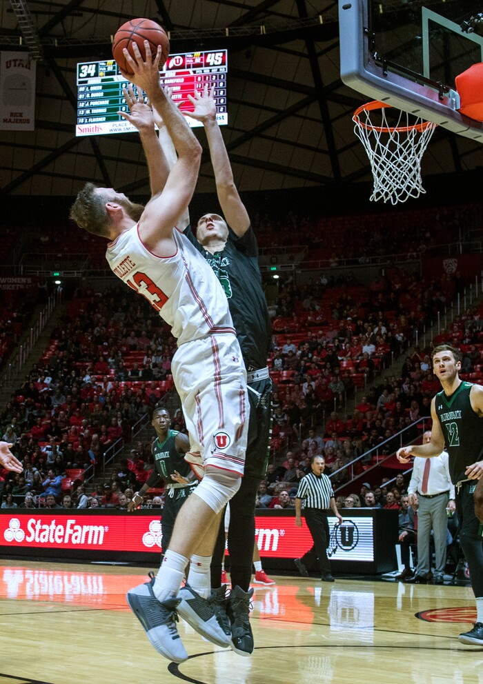 (Rick Egan  |  The Salt Lake Tribune) Utah Utes forward David Collette (13) shoots over Hawaii Warriors center Ido Flaisher (15), in basketball action, Utah Utes vs Hawaii Warriors, at the Jon M. Huntsman Center, Saturday, December 2, 2017.