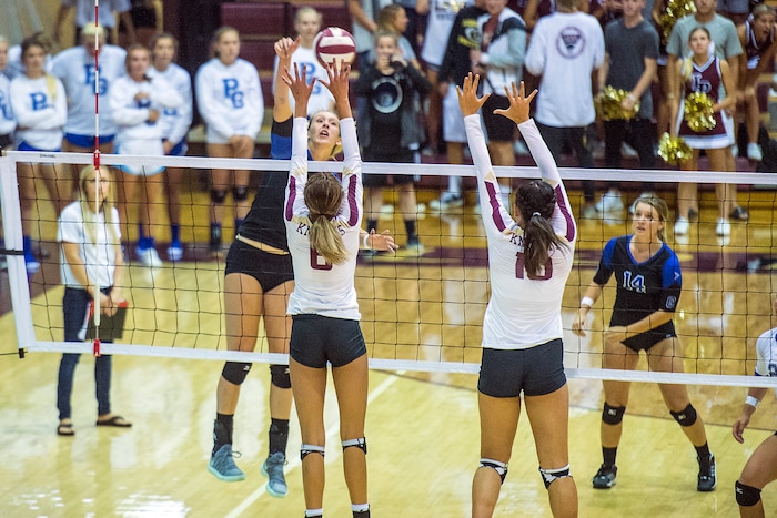 (Chris Detrick  |  The Salt Lake Tribune)  Pleasant Grove's Heather Gneiting (5) spikes the ball past Lone Peak's Tasia Farmer (6) and Lone Peak's Kennedi Boyd (10) during the volleyball match at Lone Peak High School Tuesday, September 5, 2017. 