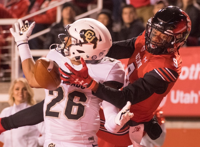 (Rick Egan  |  The Salt Lake Tribune) Colorado Buffaloes defensive back Isaiah Oliver (26) breaks up a pass intended for Utah Utes wide receiver Darren Carrington II (9), in PAC-12 football action Utah Utes vs. Colorado Buffaloes at Rice-Eccles stadium, Saturday, November 25, 2017.