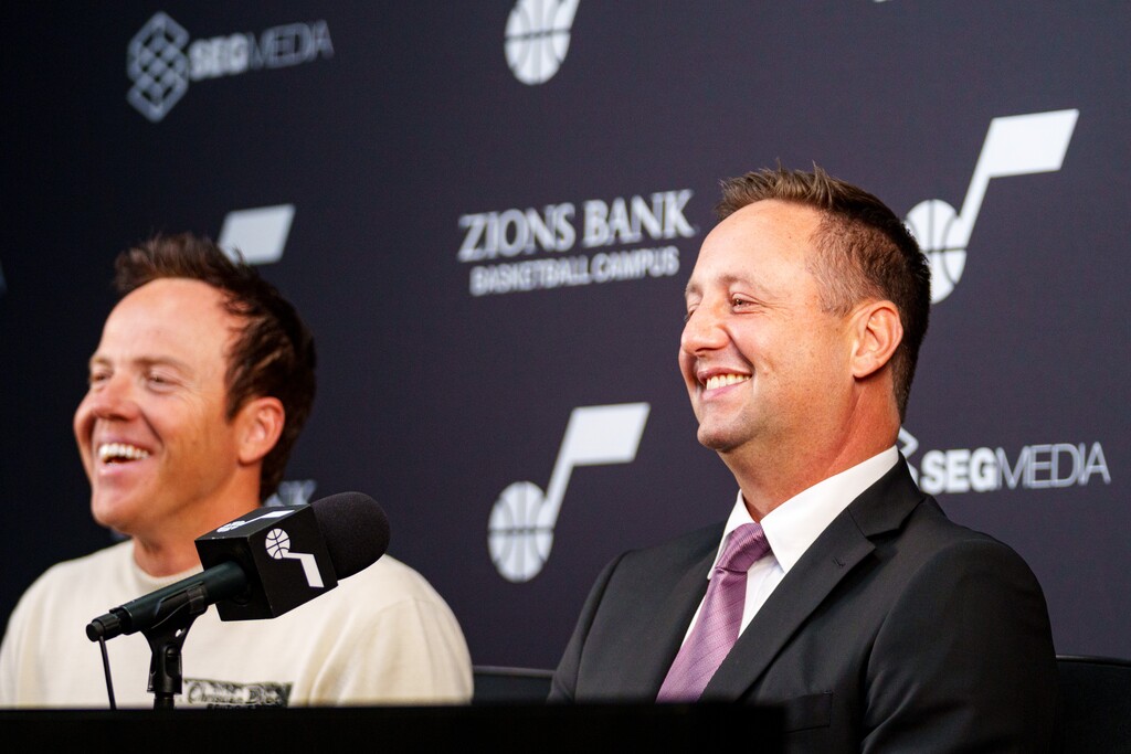 (Trent Nelson  |  The Salt Lake Tribune) Austin Ainge is introduced as the new president of basketball operations for the Utah Jazz at a news conference in Salt Lake City on Monday, June 2, 2025. At left is team owner Ryan Smith.