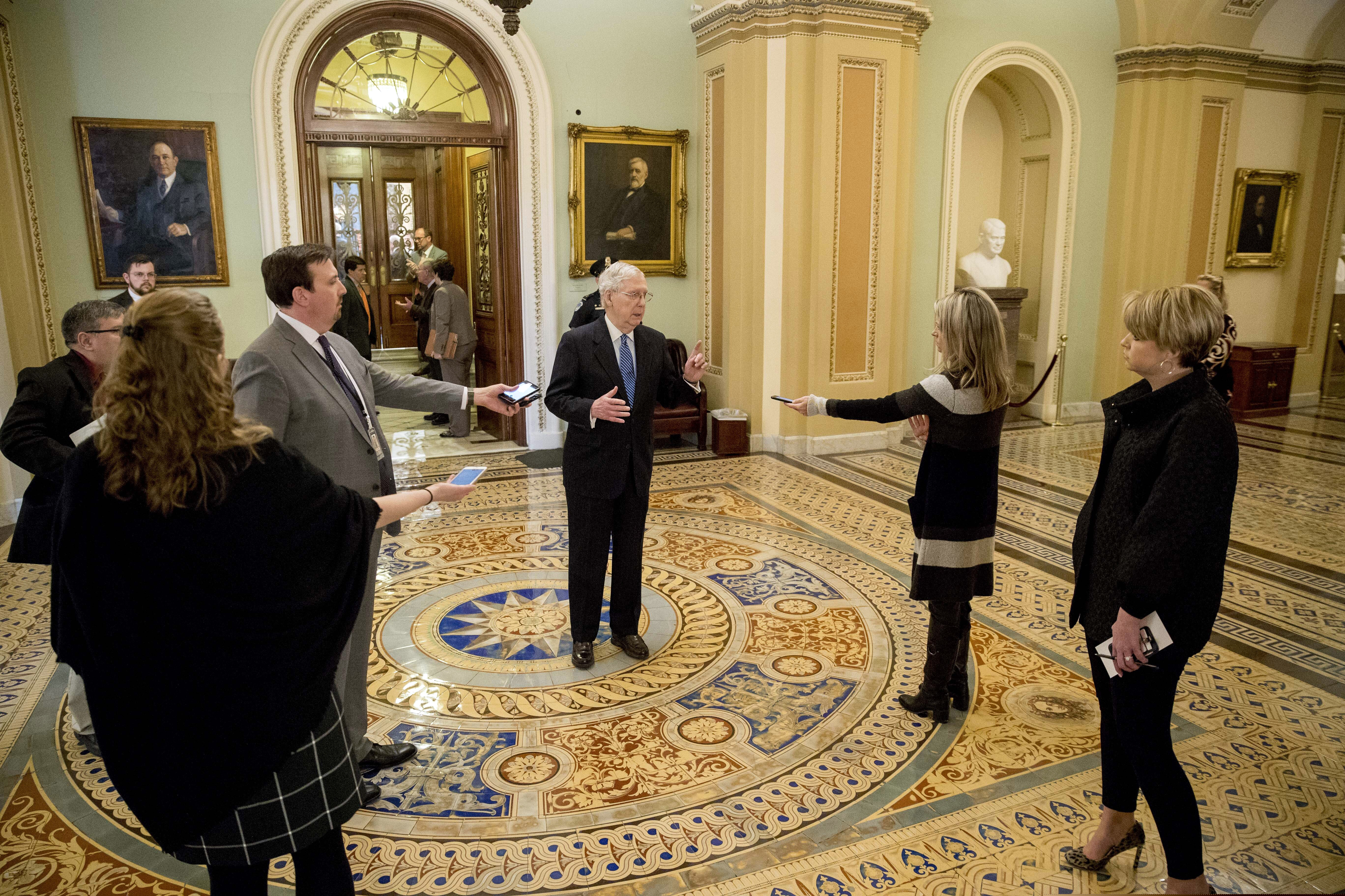 Senate Majority Leader Mitch McConnell of Ky. speaks to reporters outside the Senate chamber after Democrats blocked a coronavirus aid package on Capitol Hill, Monday, March 23, 2020, in Washington. (AP Photo/Andrew Harnik)