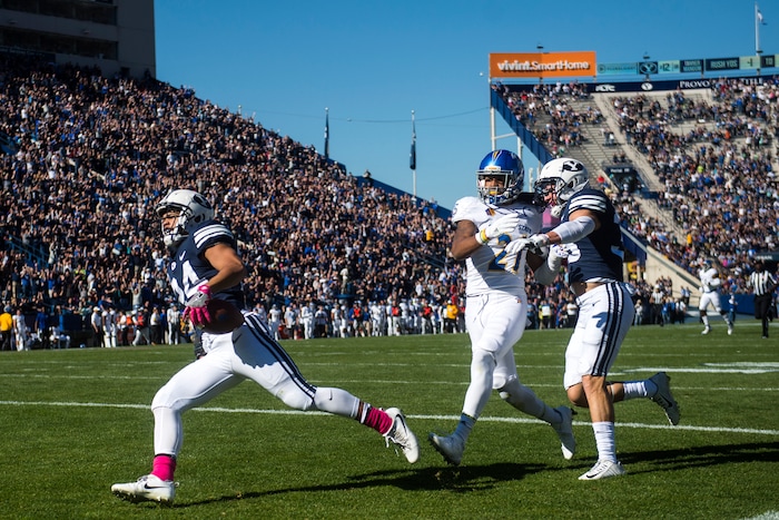(Chris Detrick  |  The Salt Lake Tribune)  Brigham Young Cougars running back KJ Hall (24) scores a touchdown past San Jose State Spartans cornerback Andre Chachere (21) during the game at LaVell Edwards Stadium Saturday, October 28, 2017.  