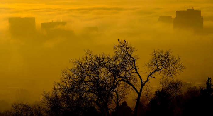 (Steve Griffin  |  The Salt Lake Tribune) The Salt Lake City skyline is obscured by dense fog as an inversion settles over the valley Tuesday December 26, 2017.