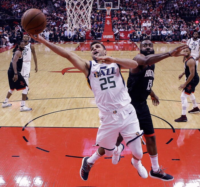 Utah Jazz guard Raul Neto (25) drives to the basket as Houston Rockets guard James Harden defends during the first half in Game 5 of an NBA basketball second-round playoff series, Tuesday, May 8, 2018, in Houston. (AP Photo/Eric Christian Smith)