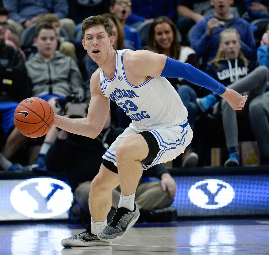 (Francisco Kjolseth  |  The Salt Lake Tribune)  Brigham Young Cougars forward Dalton Nixon (33) keeps the ball in play as BYU takes on UNLV in men's NCAA basketball at Vivint Smart Home Arena in Salt Lake City on Sat. Dec. 7, 2019.