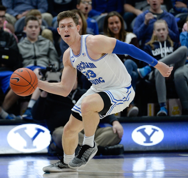 (Francisco Kjolseth | The Salt Lake Tribune) Brigham Young Cougars forward Dalton Nixon (33) keeps the ball in play as BYU takes on UNLV in men's NCAA basketball at Vivint Smart Home Arena in Salt Lake City on Sat. Dec. 7, 2019.