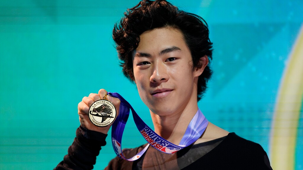 First-place finisher Nathan Chen poses with his medal in the men's championship at the U.S. Figure Skating Championships, Sunday, Jan. 17, 2021, in Las Vegas. (AP Photo/John Locher)