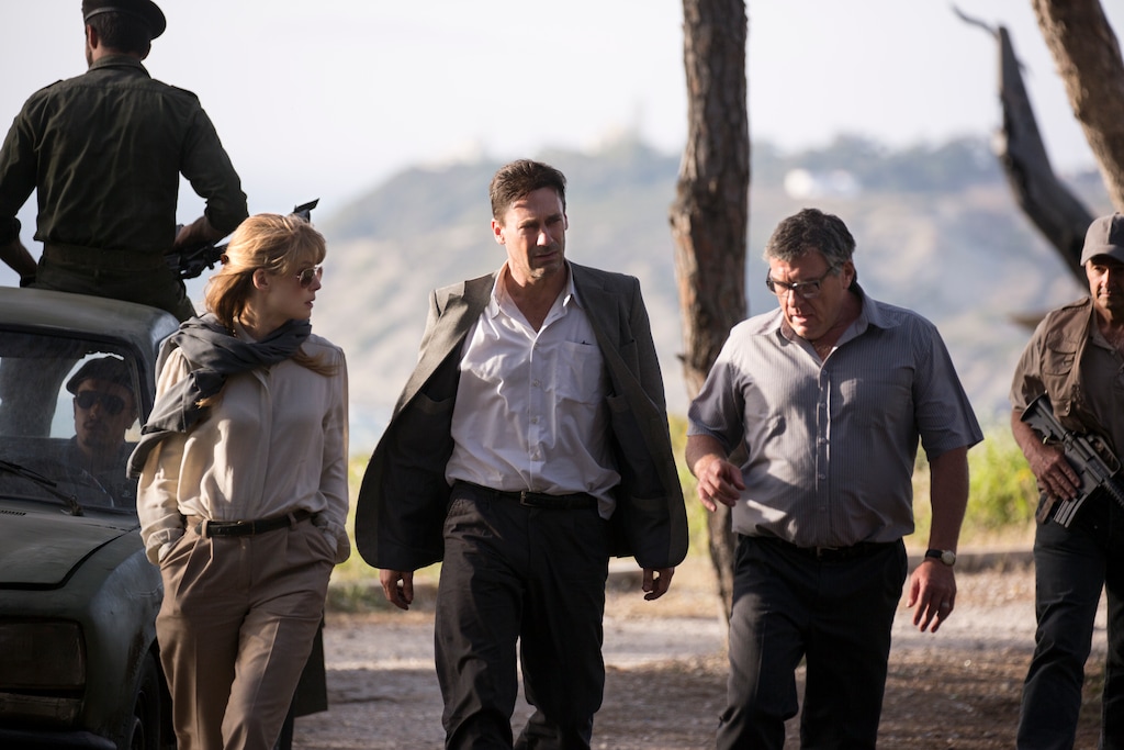 (Sife Eddine El Amine  |  courtesy Bleecker Street Films) Jon Hamm (center) plays a former diplomat brought back into action in director Brad Anderson's thriller "Beirut." The movie co-stars Rosamund Pike (left) and Dean Norris (right).