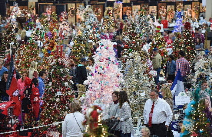 (Francisco Kjolseth  |  The Salt Lake Tribune)  People tour the Festival of Trees at the South Towne Exposition Center in Sandy on Friday, Dec. 1, 2017. The annual festival which runs through Saturday raises money for children at Primary Children's Hospital.